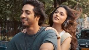 Medium shot of a man and woman riding together on a motorcycle; still from 'Saiyaara'