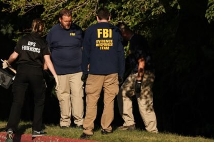 FBI shares photos, offers $100,000 reward