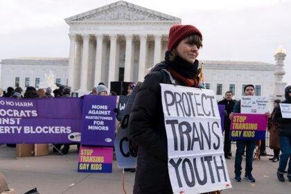 Pro-trans protesters in front of Supreme Court