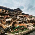Charred vehicles dumped outside the damaged building of Nepal Supreme Court. (HT Photo)