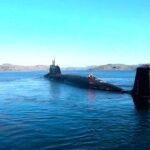 A Russian nuclear submarine sets out to sea during the practice run. Pic: AP.