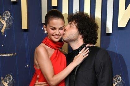 Selena Gomez, left, and Benny Blanco arrive at the 77th Primetime Emmy Awards (Richard Shotwell/Invision/AP)