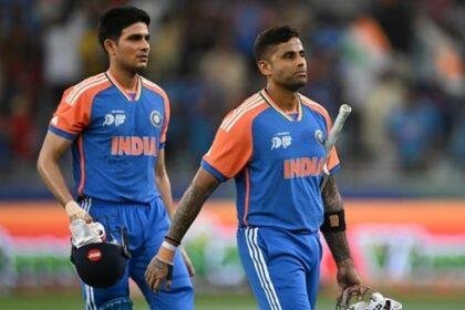 India's captain Suryakumar Yadav (R) walks along with his teammate Shubman Gill after winning vs UAE.(AFP)