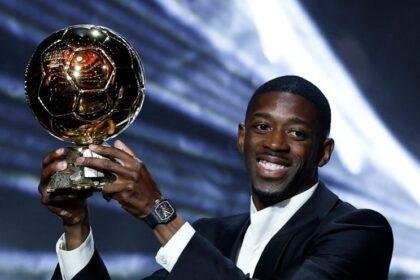 Paris Saint-Germain's Ousmane Dembele celebrates after winning the men's Ballon d'Or award