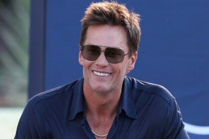 Tom Brady looks on