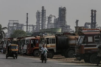 Oil tanker trucks outside an oil refinery operated in Mumbai, India.