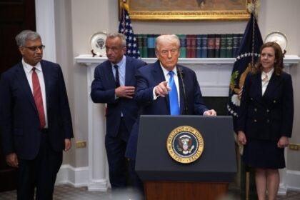 President Donald Trump (C) answers questions after making an announcement on significant medical and scientific findings for Americas children in the Roosevelt Room of the White House on September 22, 2025 in Washington, DC.