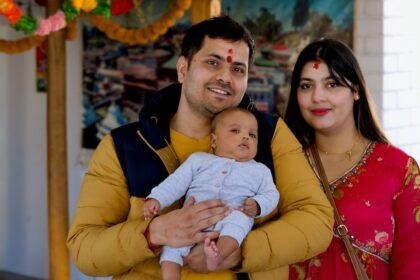 man, woman and baby.