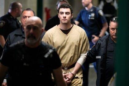 Luigi Mangione is escorted into Manhattan state court in New York on Tuesday.