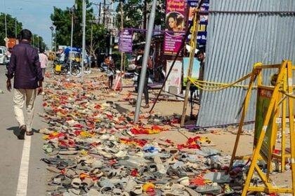 Footwear and other belongings of people, who attended the rally of actor and Tamilaga Vetri Kazhagam (TVK) chief Vijay, lie on a road in the aftermath of a stampede during the rally, in Karur district, Tamil Nadu, Sunday, Sept. 28, 2025. (PTI Photo)(PTI)
