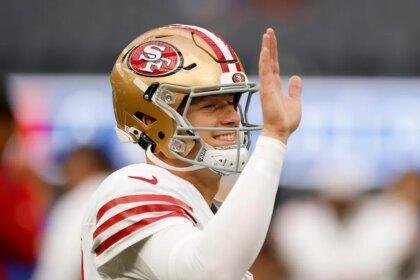 Mac Jone high fives