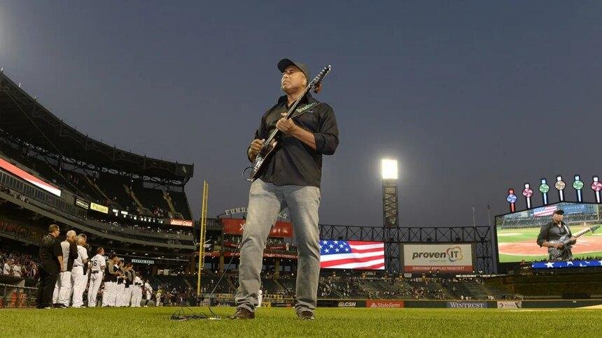 Bernie Williams guitar at MLB game