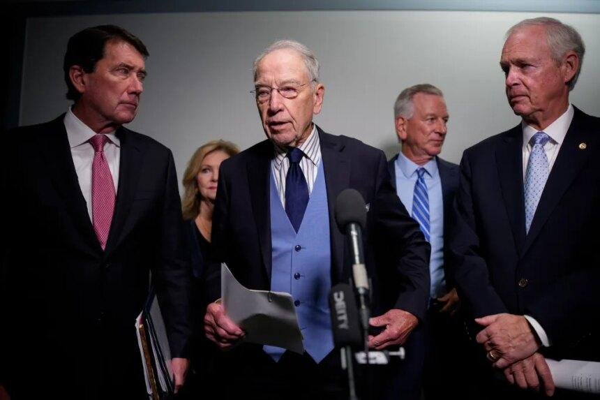 Senate Judiciary Committee Chairman Chuck Grassley speaks to reporters, accompanied by Senators Bill Hagerty, Marsha Blackburn, Tommy Tuberville, and Ron Johnson.