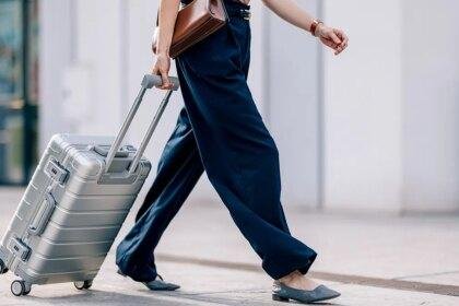 Woman with suitcase in airport