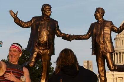 A statue depicting President Donald Trump and Jeffrey Epstein holding hands is back on display in front of US Capitol,(AP)