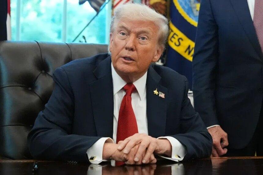 President Donald Trump speaks to reporters in the Oval Office.