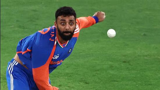 India's Varun Chakravarthy bowls during the Asia Cup 2025 final Twenty20 against Pakistan. (AFP)