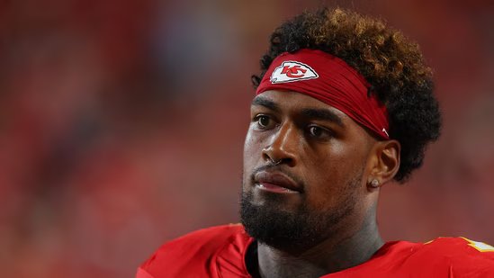 Josh Simmons of the Kansas City Chiefs watches a game from the sidelines during the second quarter during the NFL Preseason 2025.(Getty Images via AFP)