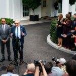 A photo of Hakeem Jeffries and Chuck Schumer holding a news conference.