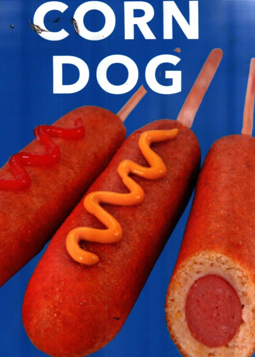 A scan of a hot dog cart featuring a corn dog closeup.